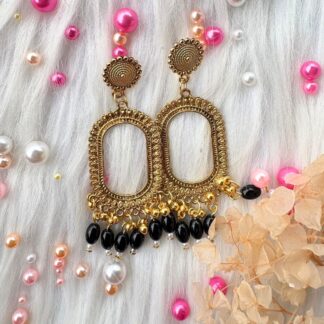 Jhumka bezel with black beeds in oval shape