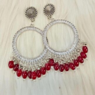silver jhumka bezel with magenta beads in round shape