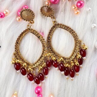 Golden jhumka bezel with wine beads in eyes shape